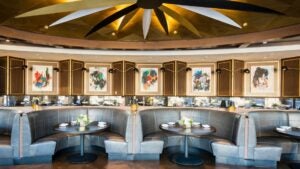 restaurant interior with booths and wall art